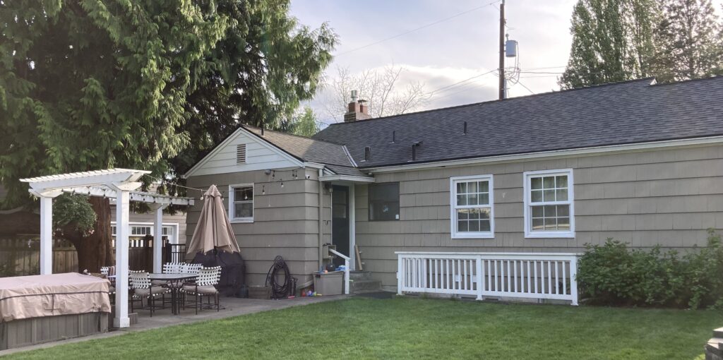 Back Before text over photo of house before additions